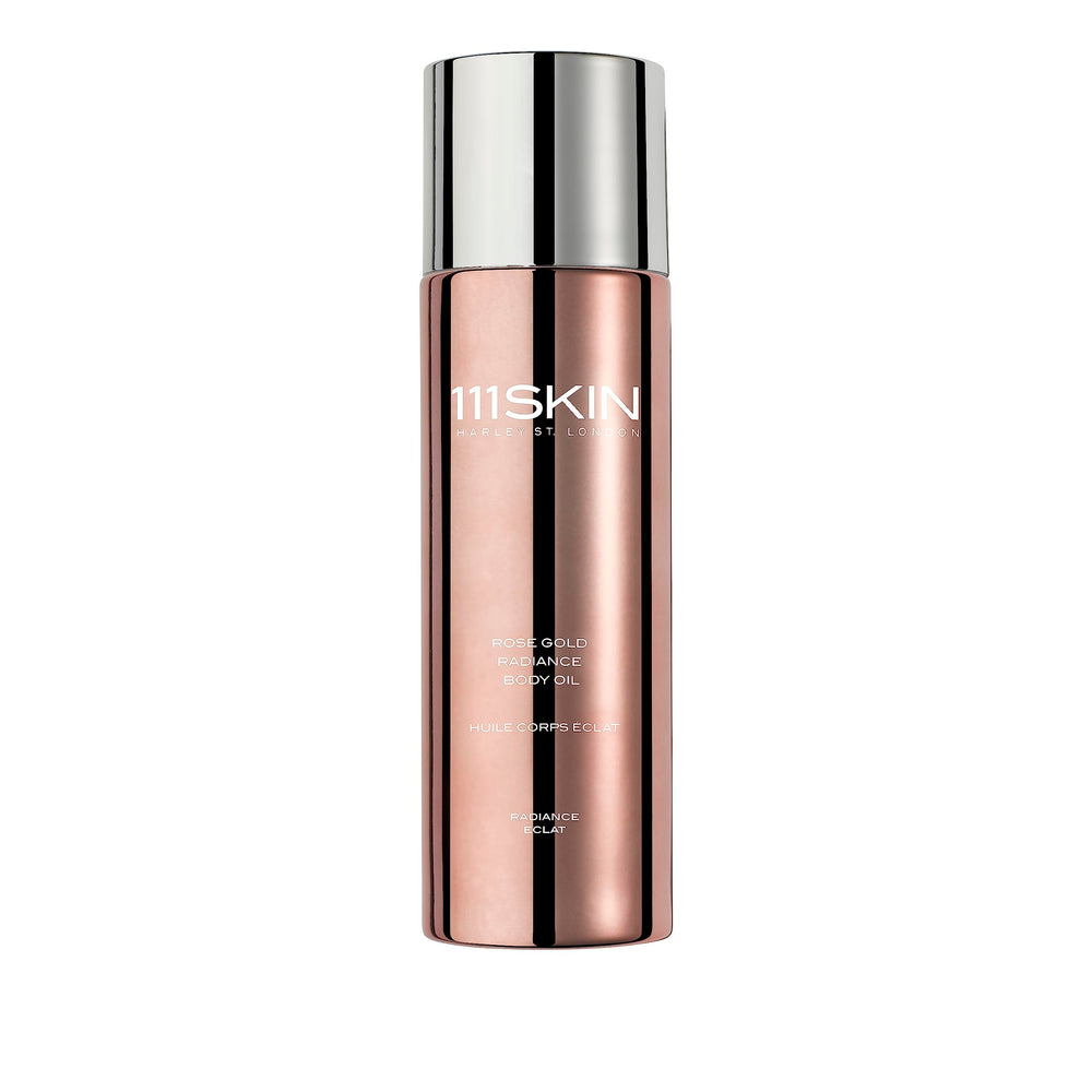 111SKIN Rose Gold Radiance Body Oil bottle pour demonstrating quick hydration