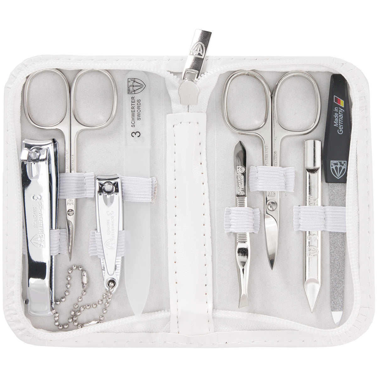 3 Swords Germany eight-piece kit in white leather case for travel grooming