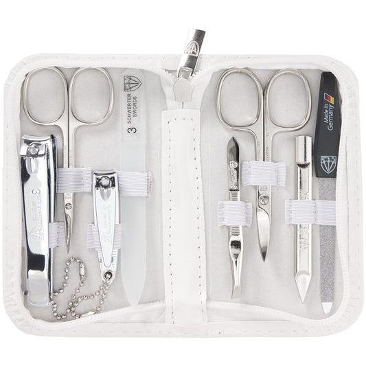 3 Swords Germany eight-piece kit in white leather case for travel grooming