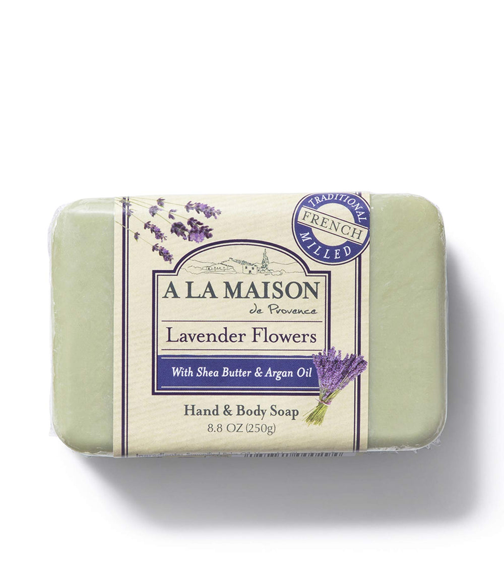 A LA MAISON Lavender Flower Bar Soap resting on a bathroom shelf with soothing aroma