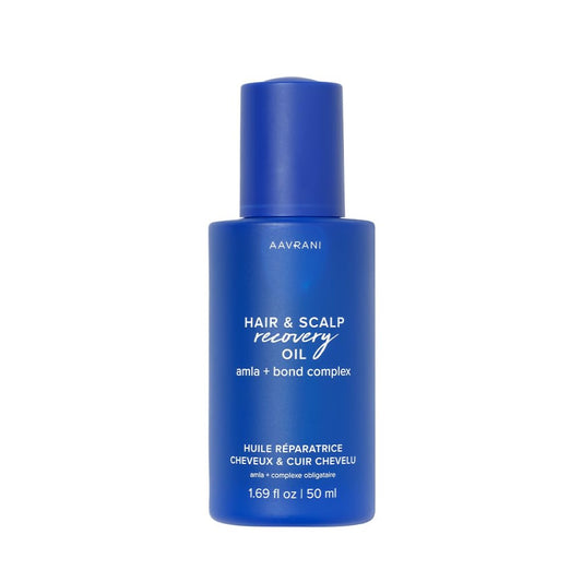AAVRANI hair oil bottle with rosemary promotes nourished scalp and smoother hair
