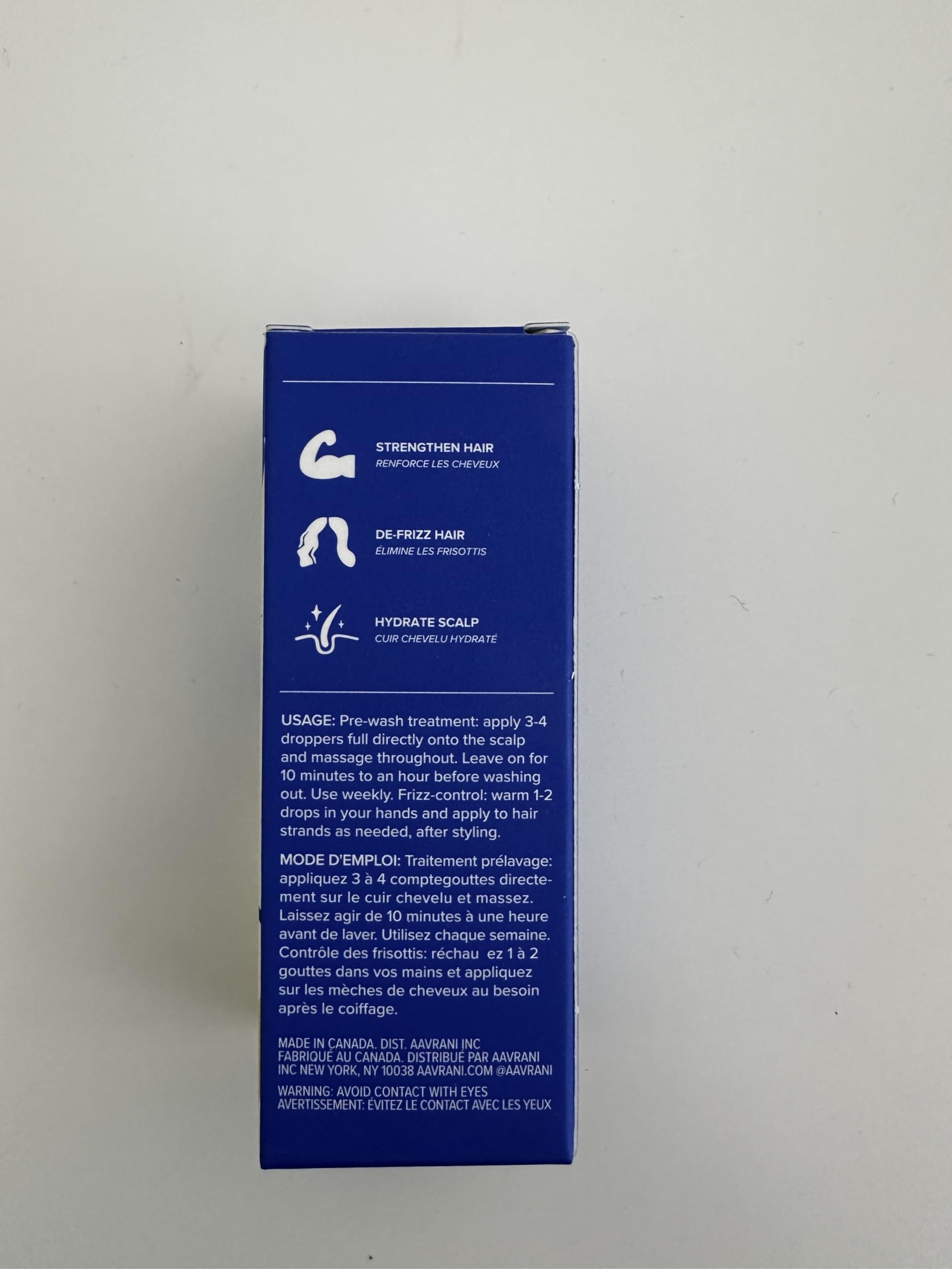 AAVRANI post-wash oil application shows frizz control and shine