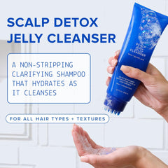AAVRANI Scalp Detox Jelly Cleanser being squeezed shows the built-in scalp scrubber in action.