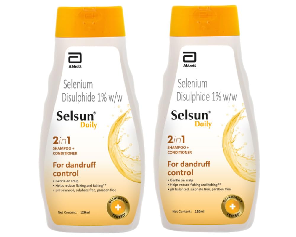 Abbott Selsun Daily shampoo bottle front promotes dandruff relief.