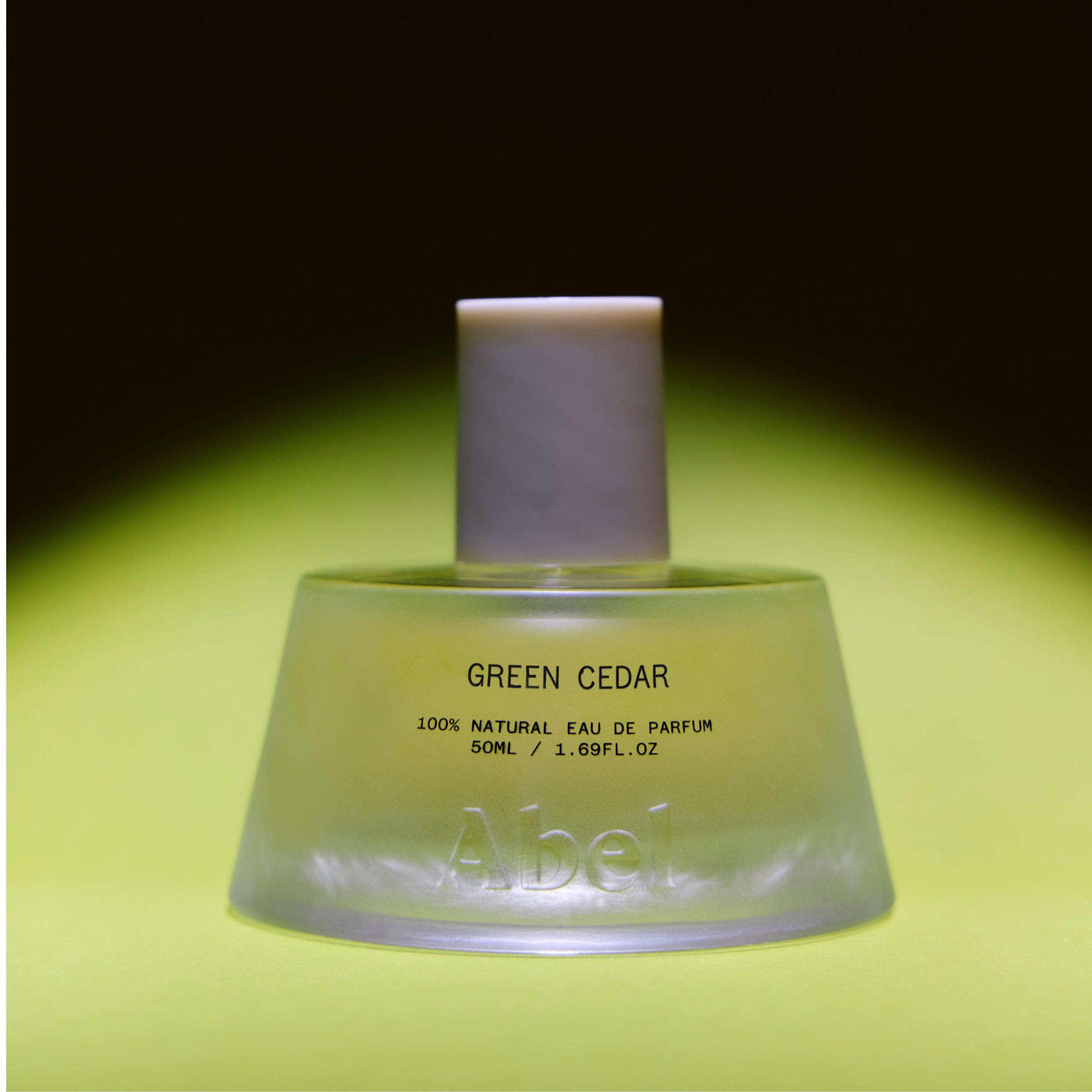 ABEL Green Cedar base notes cedarwood delivering enduring warmth.