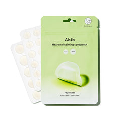 Abib Heartleaf spot patch 10mm on skin for discreet blemish care.