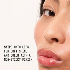 about-face Light Lock Lip Gloss Adore Me precision applicator for smooth on-the-go touches.