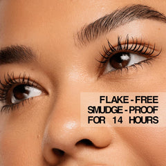 AboutFace Volumizing Mascara jet-black brush glides on smoothly.