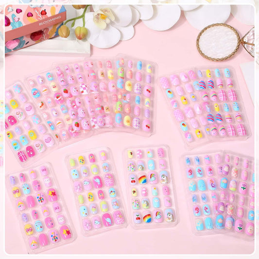 Acejoz 12 patterns press-on nails with colorful designs for creative kids' looks.