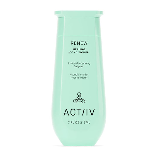 ACTIIV Renew Healing Conditioner bottle on bathroom shelf offers hydration for all hair types.
