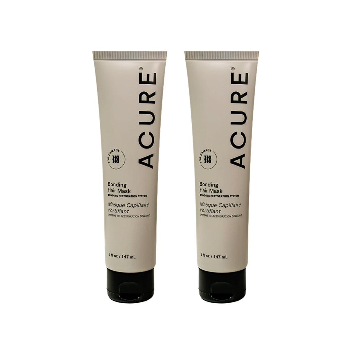 Acure Bonding Hair Mask packaging on a bathroom shelf, vegan and sulfate-free.