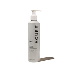 Acure Bonding Shampoo bottle closeup highlighting hydrating formula for dry, damaged hair.