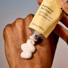 Acure Brightening Day Cream on skin hints at even tone and subtle radiance