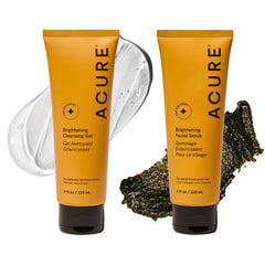 Acure Brightening Scrub bottle closeup showing exfoliating texture for smooth skin