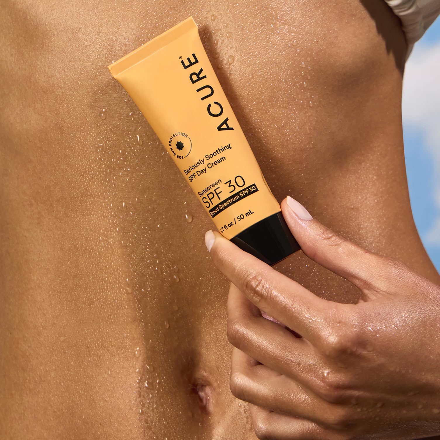 Acure 1.7 oz travel size bottle for on-the-go hydration and sun protection.