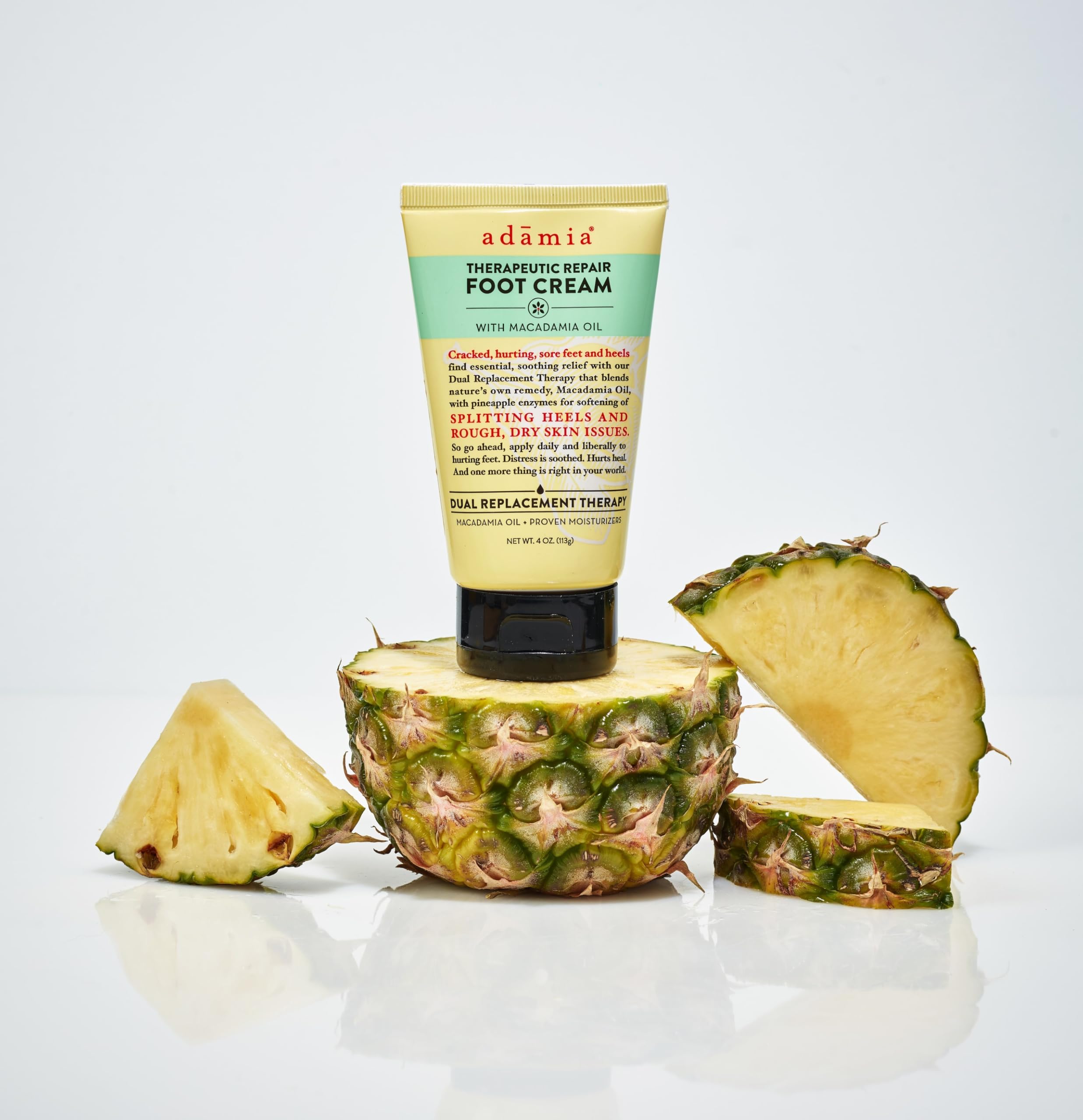 Hands applying Adamia foot cream to tired feet after a long day.
