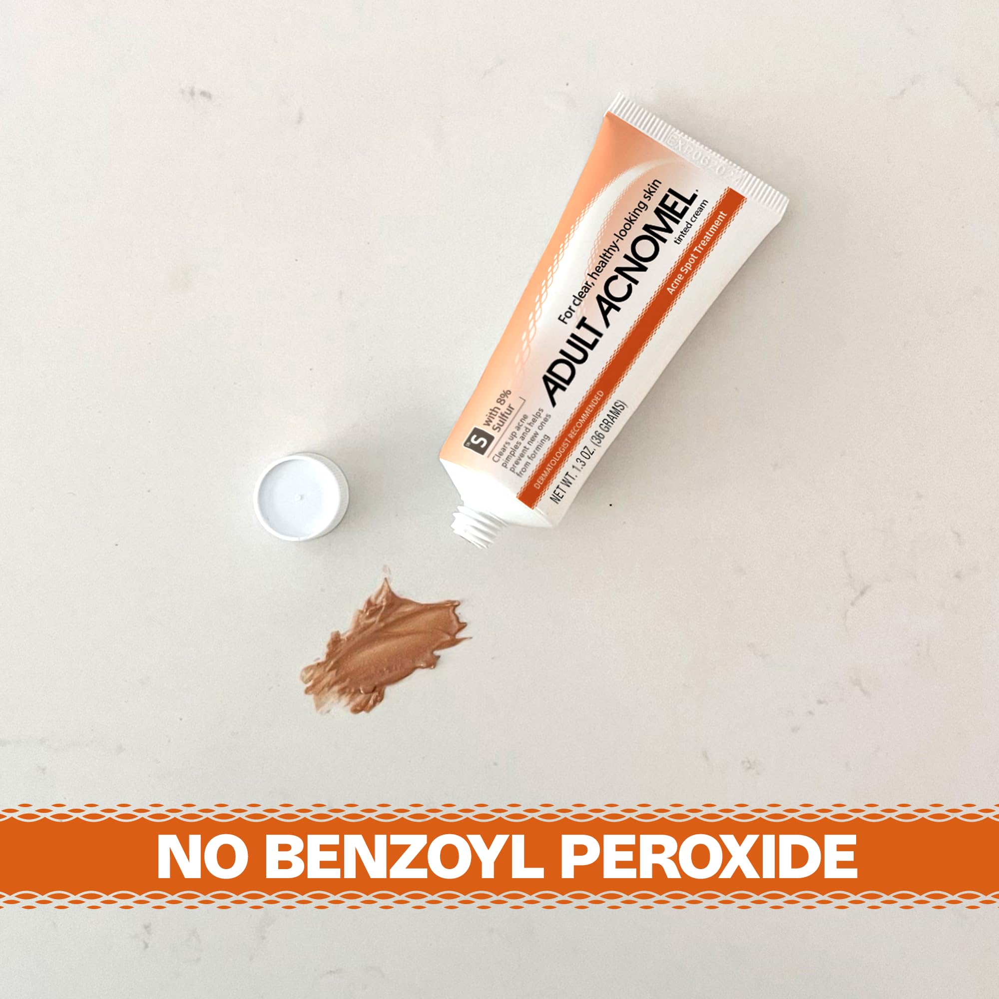 Adult Acnomel bottle label detail emphasizes non-benzoyl peroxide formula for gentler care