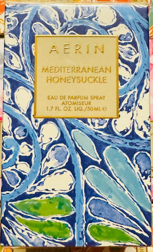 AERIN Mediterranean Honeysuckle bottle in warm light for everyday elegance