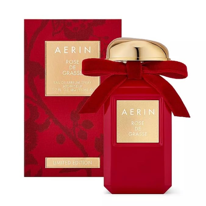 AERIN Rose de Grasse EDP bottle with red bow, elegant fall fragrance.