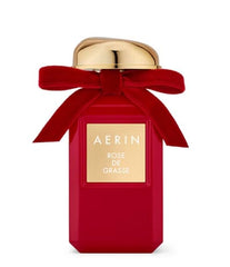 AERIN Rose de Grasse red bow packaging highlights timeless luxury.