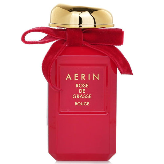 AERIN Rose De Grasse Rouge bottle shown for elegant evening wear and signature floral scent.