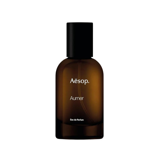 Aesop Aurner bottle front, contemporary unisex fragrance design.