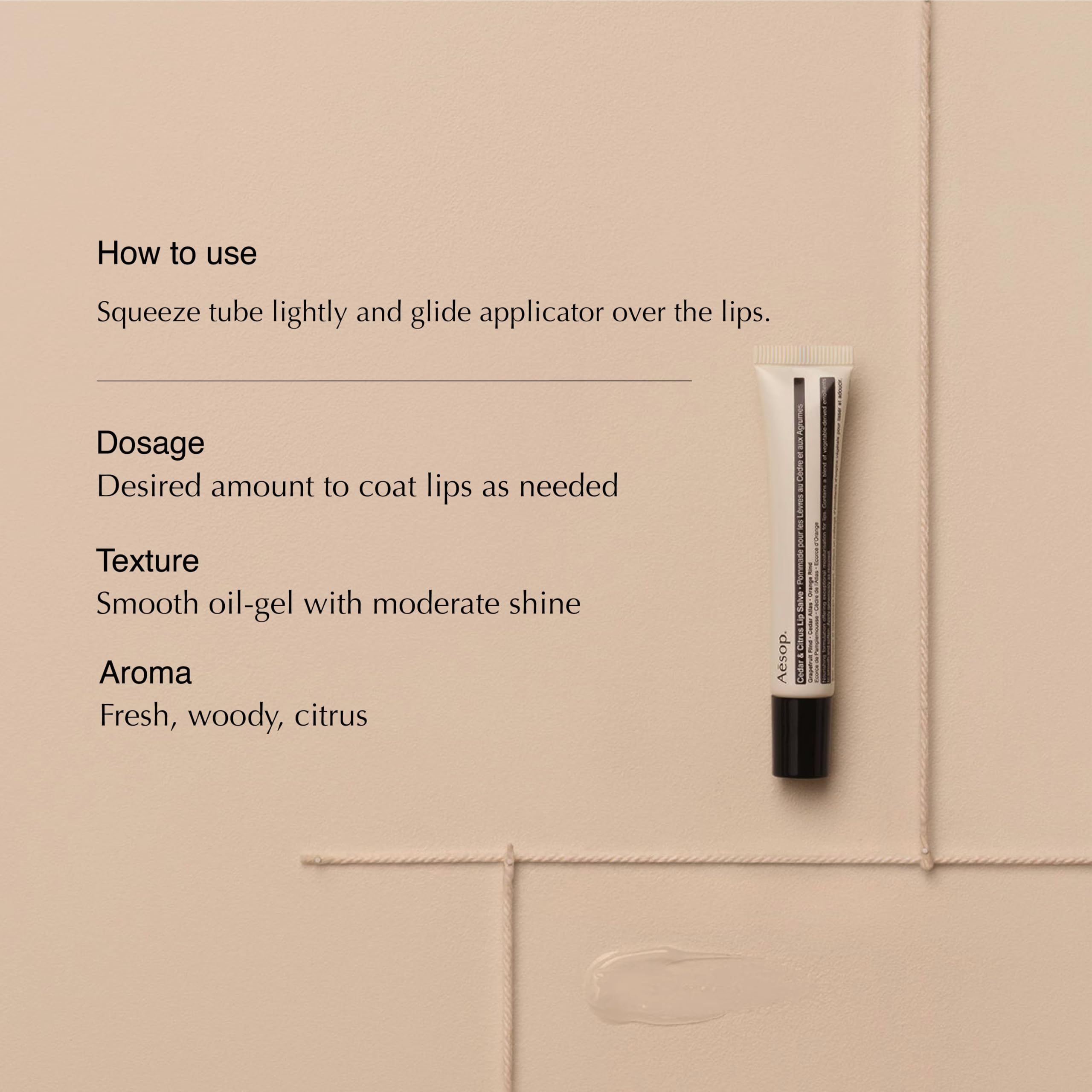 Aesop Cedar & Citrus Lip Balm squeeze-tube packaging for easy on-the-go lip care.