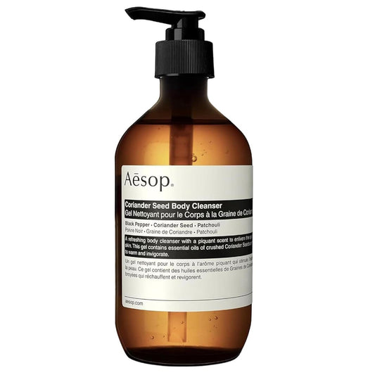 Aesop Coriander Seed Body Cleanser bottle displaying warming aroma for refreshed skin.