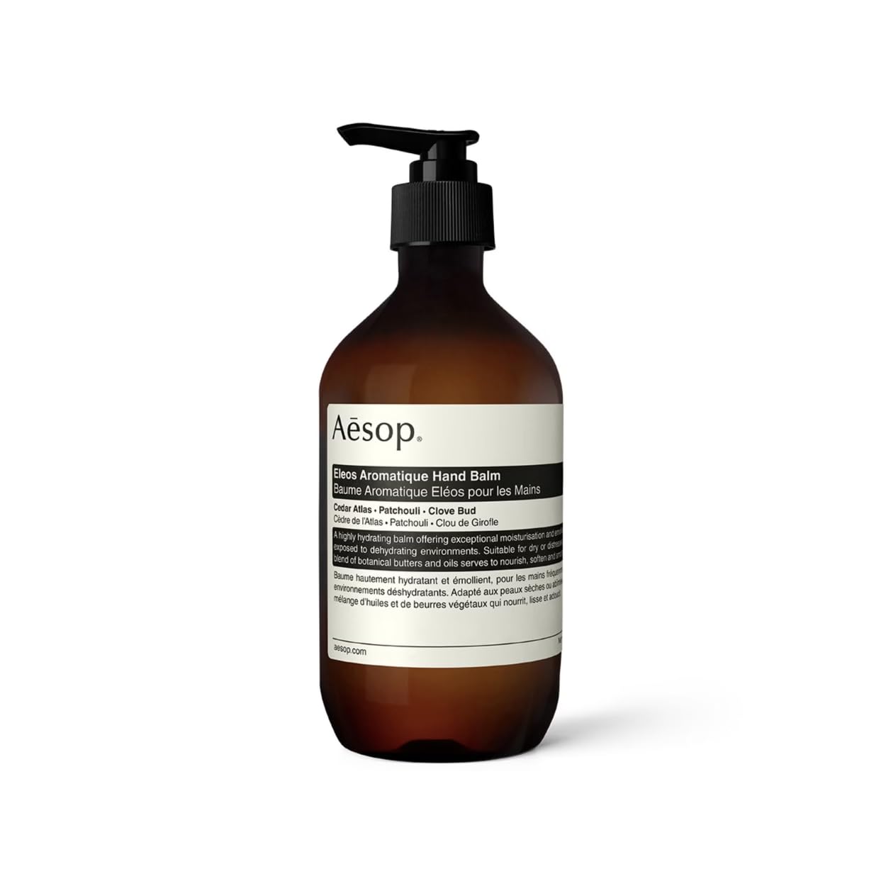 Aesop Eleos hand balm jar close-up showing rich, hydrating texture for dry hands.