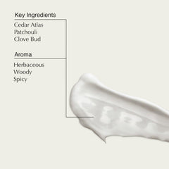 Aesop Eleos balm being applied to the hands for nourishment.