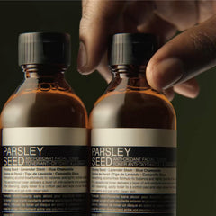 Label detail showing vegan, cruelty-free, recycled packaging promise.