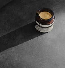 Aesop Perfect Facial Hydrating Cream dab on face reveals non-greasy, matte finish.