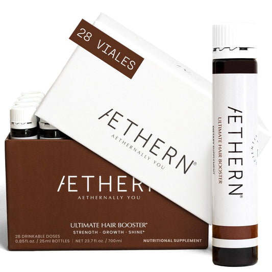 AETHERN liquid hair growth bottle on counter for daily nourishment.
