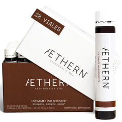AETHERN liquid hair growth bottle on counter for daily nourishment.