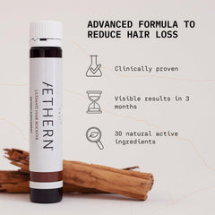 AETHERN liquid hair growth shot 25ml ready-to-drink in hand.