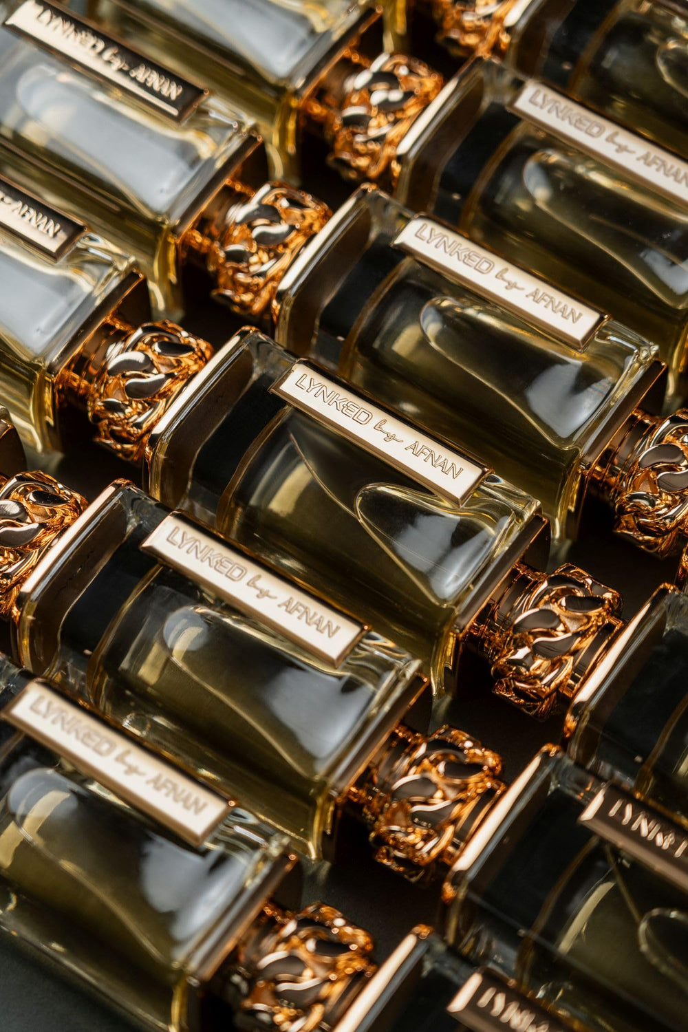 Afnan Lynked Forever Gold back view shows durable bottle design and premium feel.