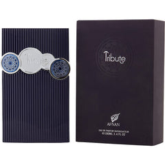 Afnan Tribute Blue Travel Edition bottle, sleek and portable for on-the-go use.