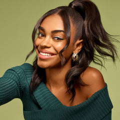 African Pride Feel It Formula Shampoo rosemary oil droplets highlighting stimulating roots.