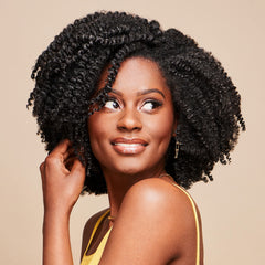 African Pride Moisture Miracle gel close-up on coil definition and shine