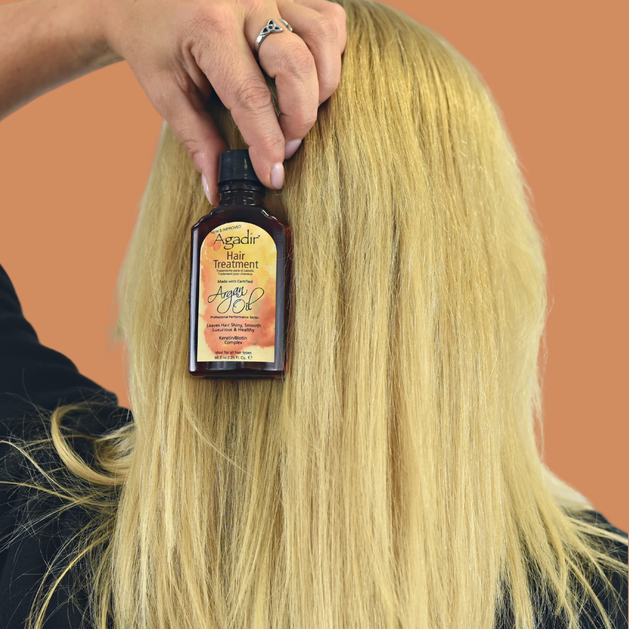 Agadir Argan Oil Hair Treatment application scene suggests easy conditioning.