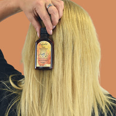 Agadir Argan Oil Hair Treatment application scene suggests easy conditioning.