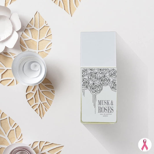 AHMED Musk & Roses fragrance spray use suggesting daytime and date wear.
