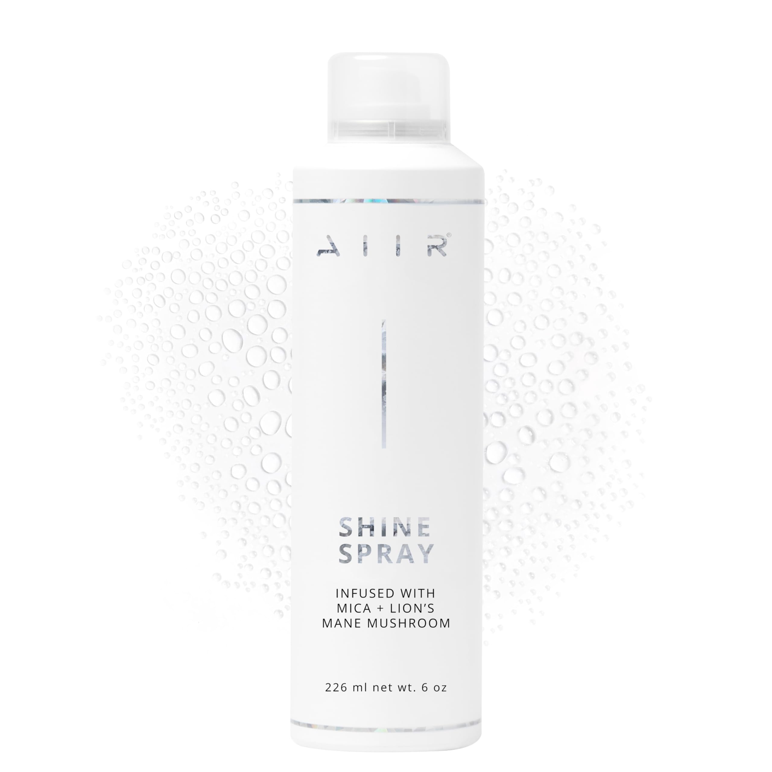 AIIR Shine Spray bottle closeup showing glossy finish and color enhancement.