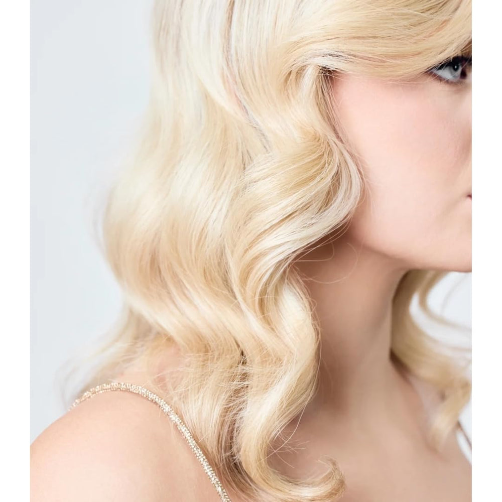 AIIR Shine Spray with Reflect enhances color depth and radiance.