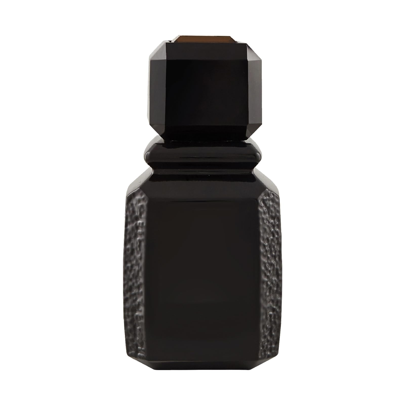 Ajmal Patchouli Wood closeup highlighting warm amber tones and textured glass for luxury appeal.