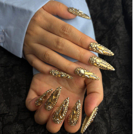 AKA Unicorn bling rhinestone acrylic nails featuring champagne stones for luxury sparkle at events