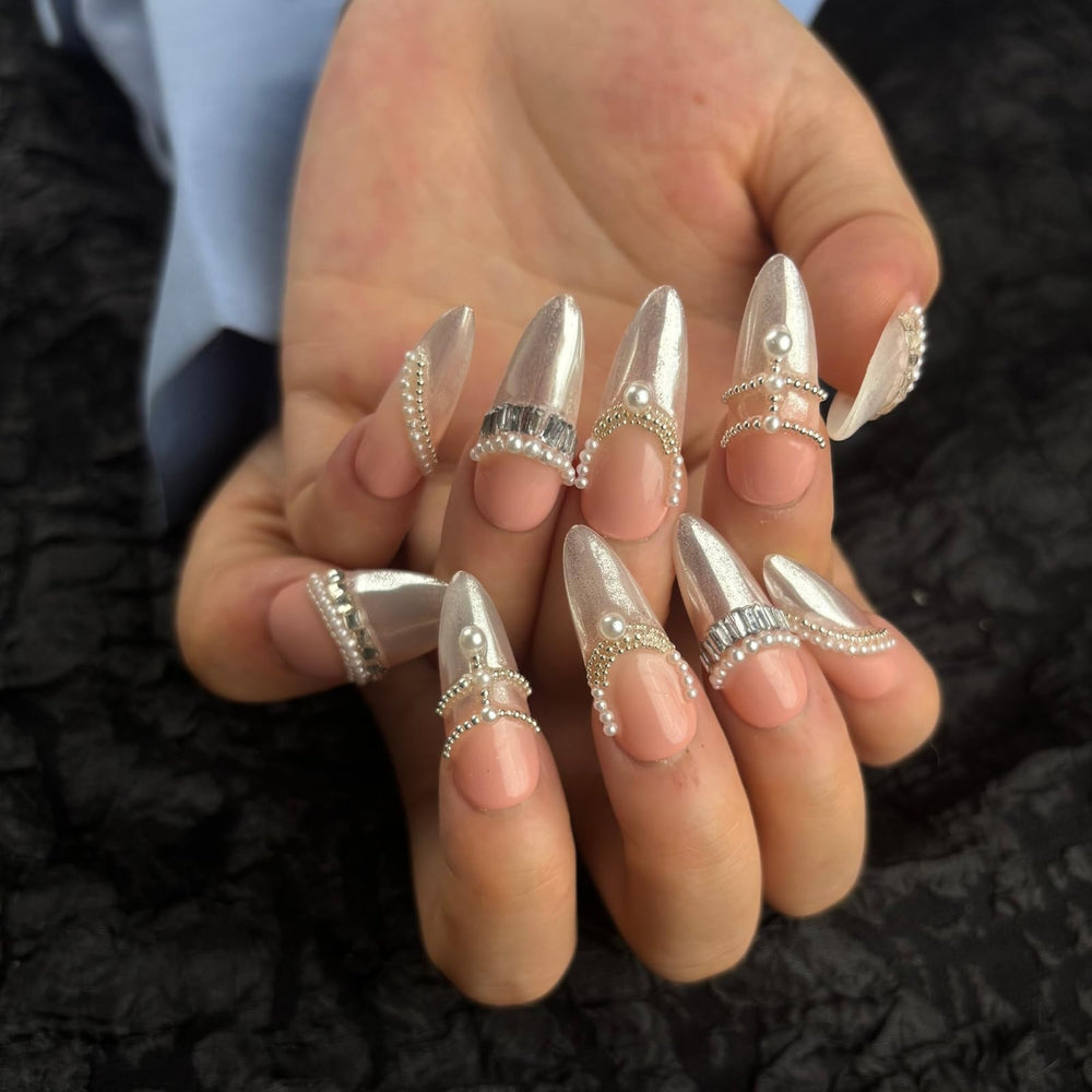 AKA Unicorn nails showing 3D pearl detail for chic French-inspired look