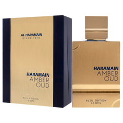 Spray bottle in action for Al Haramain Amber Oud Blue Edition EDP.