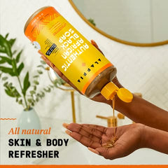 Creamy lather from Alaffia Black Soap suitable for facial and body care.