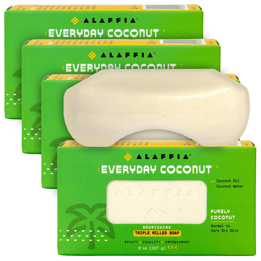 Alaffia EveryDay Coconut Soap Bar with ergonomic curve for easy grip in shower.